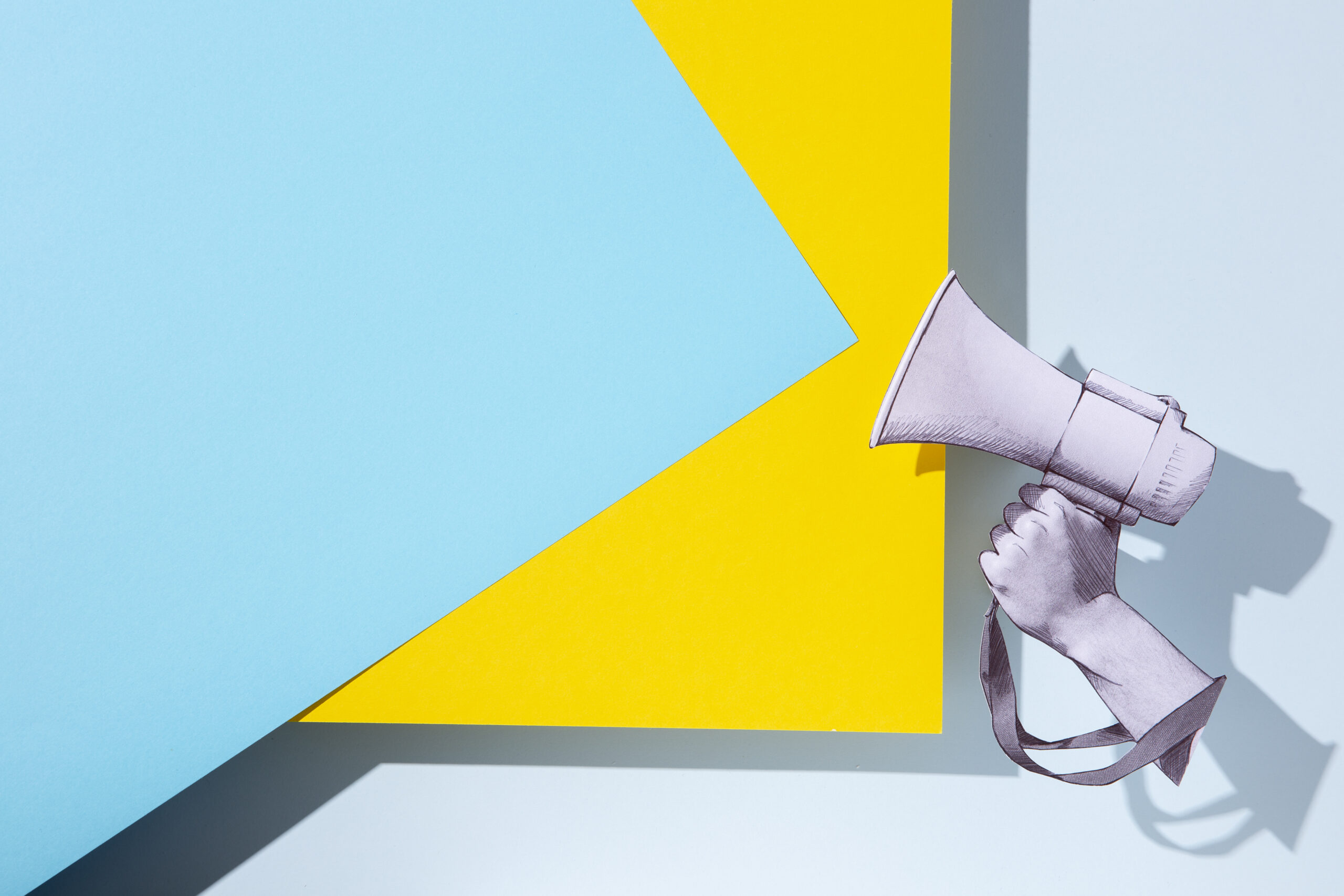 paper-hand-holding-megaphone